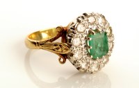 Lot 766 - An emerald and diamond ring, the step-cut...