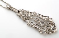 Lot 769 - An Art Deco style diamond drop pendant, of...