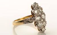 Lot 772 - A diamond ring, the eight diamonds in marquise-...