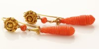 Lot 774 - A pair of carved coral and yellow metal drop...