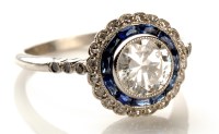 Lot 776 - A diamond and sapphire ring, the central...