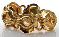 Lot 778 - A yellow metal bracelet, composed of eye...