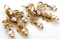Lot 784 - A pair of yellow metal and pearl earrings,...