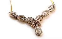 Lot 785 - A diamond necklace, the pendant of floral...