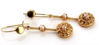 Lot 788 - A pair of diamond pendant earrings, the...