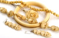 Lot 793 - A quantity of ivory jewellery, to include: a...