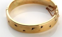 Lot 806 - A 9ct gold bangle, by C & F, Chester 1959,...