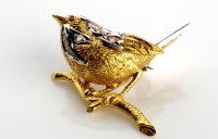 Lot 813 - A diamond set 18ct gold garden bird pattern...