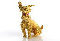 Lot 814 - An 18ct yellow gold Poodle pattern brooch, set...