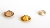 Lot 850 - Three loose diamonds, to include: a diamond...