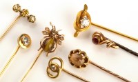 Lot 857 - A collection of tie pins, to include: one with...