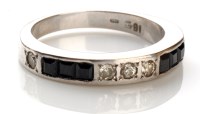 Lot 860 - A sapphire and diamond half-hoop eternity ring,...