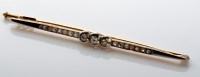 Lot 888 - A diamond brooch, the three slightly...