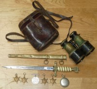 Lot 920 - A collection of military items, belonging to...