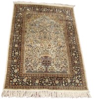 Lot 1009 - A late 20th Century Kashmir silk rug,...