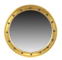 Lot 1042 - A circular Victorian convex wall mirror, the...