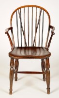 Lot 1050 - A 19th Century Windsor open arm chair with...