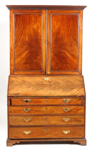 Lot 1051 - A George III mahogany bureau bookcase with a...