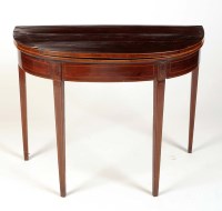 Lot 1056 - A late George III mahogany bowfront tea table...