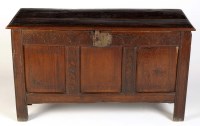 Lot 1057 - A late 17th Century carved oak coffer, the...