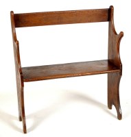 Lot 1081 - A small 18th Century elm settle, with rail...