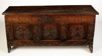 Lot 1090 - An 18th Century oak coffer with later lid...