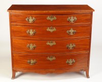 Lot 1094 - A George III mahogany bowfront chest of four...