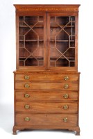 Lot 1098 - A George III mahogany secretaire bookcase with...