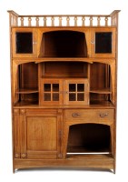 Lot 1104 - A Continental oak Arts & Crafts design cabinet,...