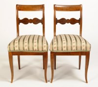 Lot 1110 - A set of four German stained beech dining...