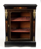 Lot 1115 - A Victorian ebonised pedestal cabinet, with...