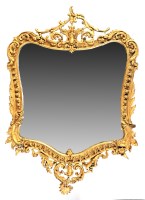 Lot 1116 - A 19th Century wall mirror, the ornate gilt...