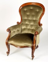 Lot 1153 - A Victorian walnut balloon-back easy chair,...