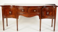 Lot 1156 - A Georgian style mahogany serpentine front...