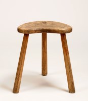 Lot 1188 - A Mouseman oak kidney-shaped stool, raised on...
