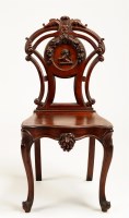 Lot 1197 - A late Victorian mahogany hall chair, with...