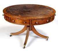 Lot 1203 - A late Georgian circular mahogany drum table...