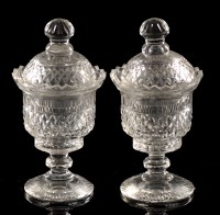 Lot 276 - A pair of cut glass honey jars and covers,...
