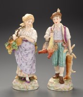 Lot 324 - A pair of Continental figures of a game hawker...