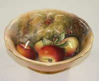Lot 361 - Royal Worcester: a bowl, painted with fruits...