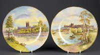 Lot 375 - Royal Worcester: a pair of plates depicting...