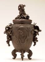 Lot 449 - A bronze vase and cover, circa 1900, the cover...