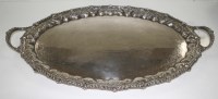Lot 475 - A late Victorian two-handled tea tray, shaped...