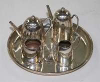 Lot 497 - An Elizabeth II four-piece miniature tea...