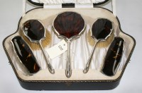 Lot 511 - A George V five-piece silver and faux...