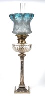 Lot 512 - An Edwardian silver and cut glass oil lamp, by...