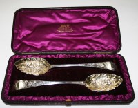 Lot 562 - A pair of George III berry spoons, by James...
