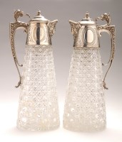 Lot 571 - A matched pair of cut glass and silver-mounted...