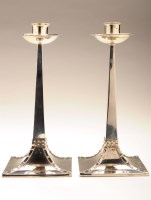 Lot 577 - A pair of Edwardian candlesticks, by James...