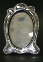 Lot 592 - An Edwardian silver photograph frame, by...